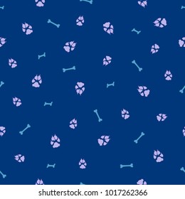 Colorful dog footprint and bone vector seamless pattern. Sweet paw bone seamless template, isolated on contrast color backdrop. Drawn silhouette clipart for web purposes or invitation print.