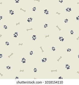 Colorful dog footprint and bone vector seamless pattern. Colored paw bone seamless template, isolated on contrast color background. Drawn silhouette clipart for corporate purposes or wallpaper print.