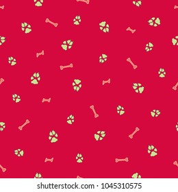 Colorful dog footprint and bone vector seamless pattern. Trendy paw bone seamless template, isolated on contrast color backdrop. Drawn silhouette clipart for business purposes or holiday print.