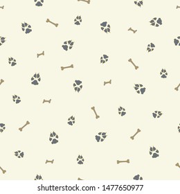 Colorful dog footprint and bone vector seamless pattern. Cool paw bone seamless template, isolated on contrast color backdrop.