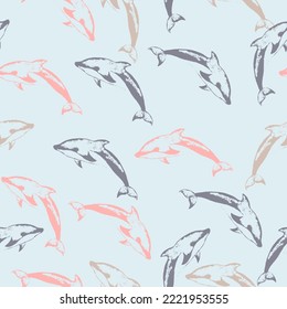 Colorful dolphins playing in the waves. Vector seamless pattern. Marine theme, ocean. Summer graphic design pattern with cute fishes. Vector.