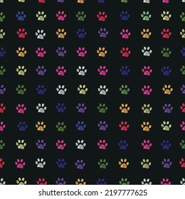 Colorful doodle paw prints background with white paw prints seamless fabric pattern