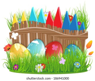 Colorful  Easter eggs with abstract pattern near a painted wooden fence in the meadow