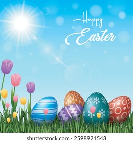 Colorful Easter eggs with flowers in the grass