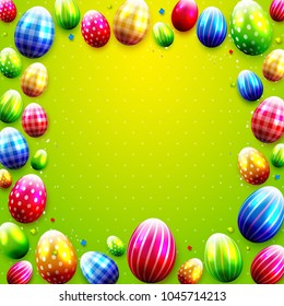 Colorful Easter eggs on green background. Place for your text