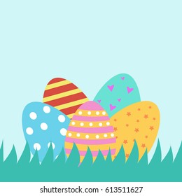 Colorful Easter eggs on green grass are shown in the image.