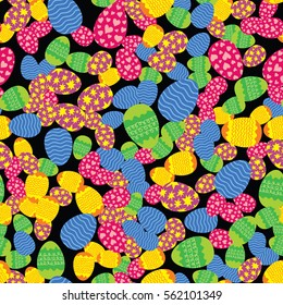 Colorful Easter eggs randomly placed on black background. Christian holiday seamless pattern. Wrapping or greeting card texture. Bright colors vector eps8 illustration.