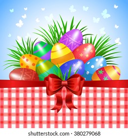 Colorful Easter eggs and red ribbon for holidays design.
