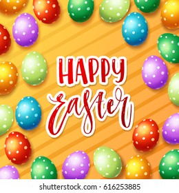 Colorful  eggs with hand drawn calligraphy "happy Easter"   
