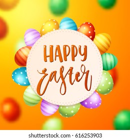 Colorful  eggs with hand drawn calligraphy "happy Easter"   