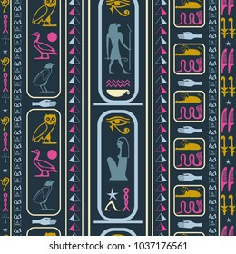 Colorful egypt writing seamless pattern. Hieroglyphic egyptian language symbols grid. Repeating ethnical fashion background for wrapping paper.