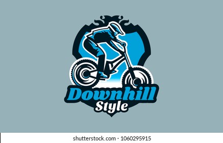 Colorful emblem, badge, logo of a rider on a mountain bike. Bicycle, transport, downhill, freeride, extreme, sports. T-shirt printing, vector illustration.