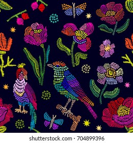 Colorful embroidered texture inspired by folk art. Seamless vector pattern with birds, branches and flowers. Vintage motifs. Retro textile design collection. Colorful on dark.
