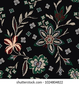 Colorful embroidey flower in pattern texture.