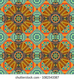 Colorful endless background in blue, brown and orange colors. Vector ethnic seamless pattern with tribal abstract elements.