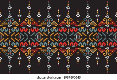 Colorful Ethnic abstract background. Seamless pattern in tribal, folk embroidery, and Mexican style. Aztec geometric art ornament print.Design for carpet, wallpaper, clothing, wrapping, fabric, cover