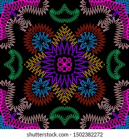 Colorful ethnic embroidery seamless pattern. Tapestry stitchind vector background. Tribal grunge zig zag paisley flowers, shapes. Textured fabric pattern. Hand drawn embroidered zigzag ornament.