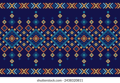 Un colorido patrón étnico con diamantes y triángulos sobre un fondo azul oscuro. Diseño para tela, motivo, tribal, raya, ornamental, mexicano, repetición, triángulo, alfombra, bordado, retro, ilustración, patrón.