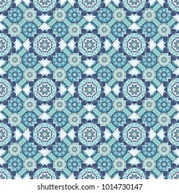 Colorful ethnic seamless background pattern in the style of ceramic tiles. Oriental vector ornament in brown, blue and gray colors.