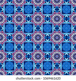 Colorful ethnic seamless background pattern in the style of ceramic tiles. Oriental vector ornament in blue, pink and brown colors.