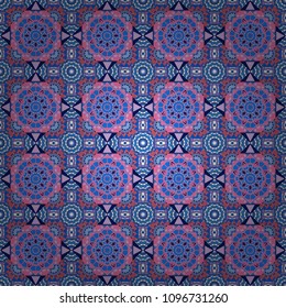 Colorful ethnic seamless background pattern in the style of ceramic tiles. Oriental vector ornament in purple, blue and pink colors.