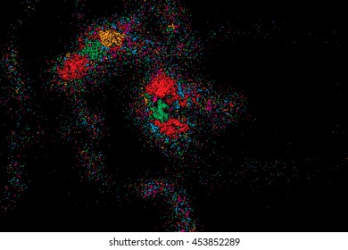 Colorful explosion of confetti. Isolated on black background. Coloured glitter and sprinkles. Grainy abstract holiday illustration. Multi colored texture.