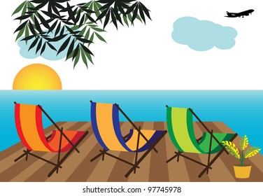 Colorful extensible chairs near the ocean. Vacation concept