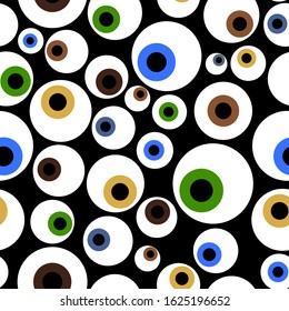 colorful eyeballs seamless pattern on a black background. concept of magic, mysticism and voodoo. for fabric, cards, prints, wallpapers