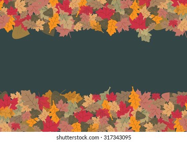 Colorful fallen leaves in autumn colors are at the top and bottom on a trendy dark green sheet.