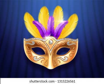 Colorful feather masquerade mask with diamonds. Carnival or party, festival celebration golden face cover. Part of theater costume. Colombina masque design for mardi gras festive. Celebration theme