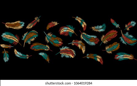 Colorful feathers embroidery seamless border stripe. Boho tribal clothes indian bird classic embroidered background. Fashionable template design vector illustration