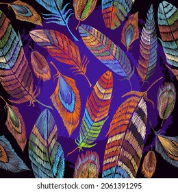 Colorful  feathers. Embroidery. Tropical birds art. Seamless pattern. Fashion template for clothes, textiles, t-shirt design