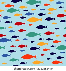 Colorful fish flock seamless pattern. School of fish swiming in one direction. Vector illustration.