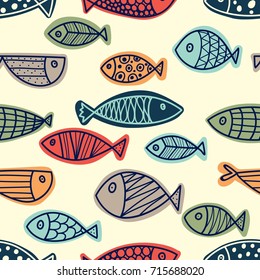Colorful fish.  Seamless pattern with cute fish. Sea background.