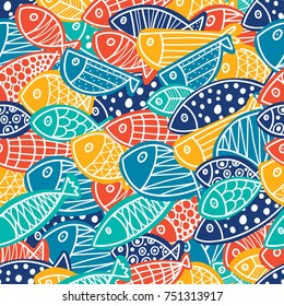 Colorful fish. Seamless pattern with cute ornamental fish. Sea background.