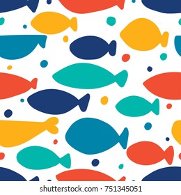 Colorful fish. Seamless pattern with cute ornamental fish. Sea background.