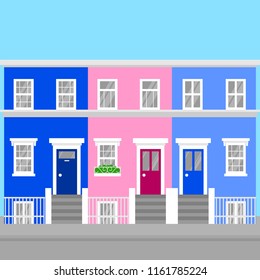 Colorful flat terraced town houses Notting Hill in London. England Travel icon landmark. United Kingdom architecture sightseeing.