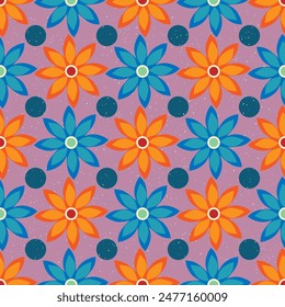 A colorful floral pattern with blue, green, and orange flowers. The flowers are surrounded by small dots, creating a vibrant and lively atmosphere