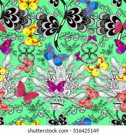Colorful floral seamless pattern with butterflies and flowers on green background vector illustration