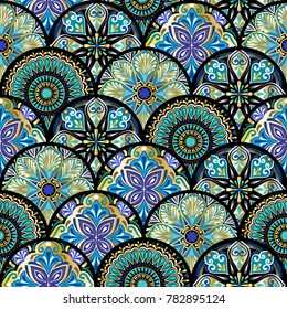 Colorful floral seamless pattern from circles with mandala in patchwork boho chic style