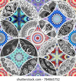 Colorful floral seamless pattern from circles with mandala in patchwork boho chic style