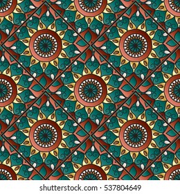 Colorful floral seamless pattern from different rhombus with mandala in patchwork boho chic style, in portuguese and moroccan motif