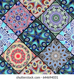 Colorful floral seamless pattern from different rhombus with mandala in patchwork boho chic style, in portuguese and moroccan motif
