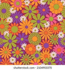 Colorful floral seamless pattern. Groovy flowers vector illustration, hippie aesthetic. Funny multicolored print for fabric, paper, any surface design. Psychedelic wallpaper