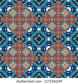 Colorful flower seamless pattern. Stylized floral motif in brown, blue and gray colors. Round ornament decoration. Mandala vector element.