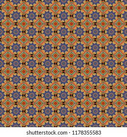 Colorful flower seamless pattern. Stylized floral motif in violet, yellow and orange colors. Round ornament decoration. Mandala vector element.