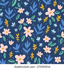 Colorful flowers on deep blue background seamless pattern