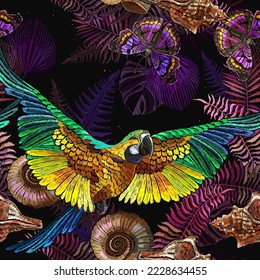 Colorful flying ara parrots, ammonite fossil, colorful butterfllies and palm leaves. Seamless pattern. Embroidery. Prehistoric concept. Template for clothes. Ancient tropical forest background