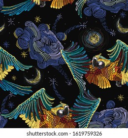 Colorful flying ara parrots, moon and night sky seamless pattern. Macaws. Magic romantic background. Fashionable template for design of clothes, textiles 