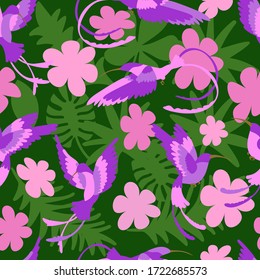 Colorful flying hummingbirds on green background with tropical leaves and pink flowers. Seamless floral pattern, vector. 